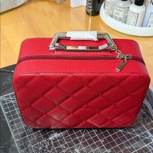 BNWOT Elegant Red Quilted Handbag toiletry.